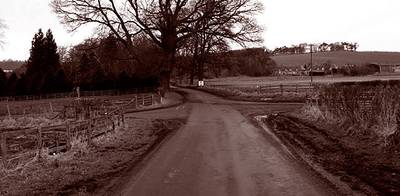 Photo of a dirt crossroads by James Denham