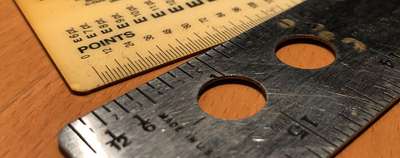 Close-up of two rulers